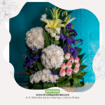 White Chandramollika Lily Pink Rose Purple Statice Basket Arrangement